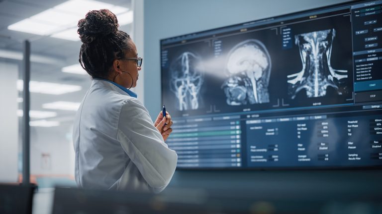 Doctor looking at MRI images